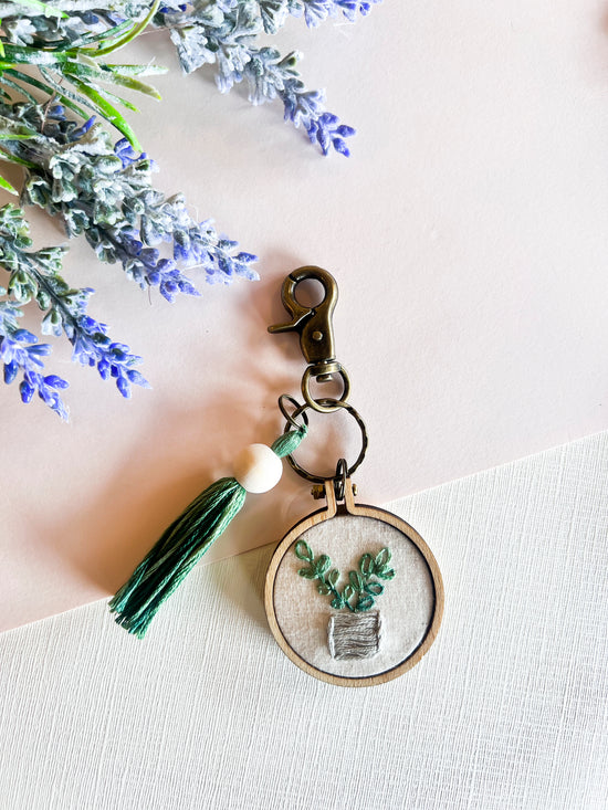 Load image into Gallery viewer, Hand Embroidered Floral Keychains | Handmade Flower Keychain | Boho Natural Wood Thread Tassel
