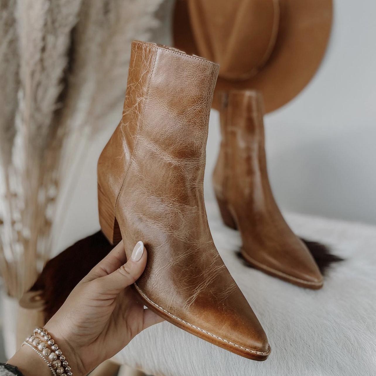 Matisse Caty Ankle Boot in vintage tan leather with pointed toe and block heel, featuring a smooth, distressed leather finish and a sleek, Western-inspired design