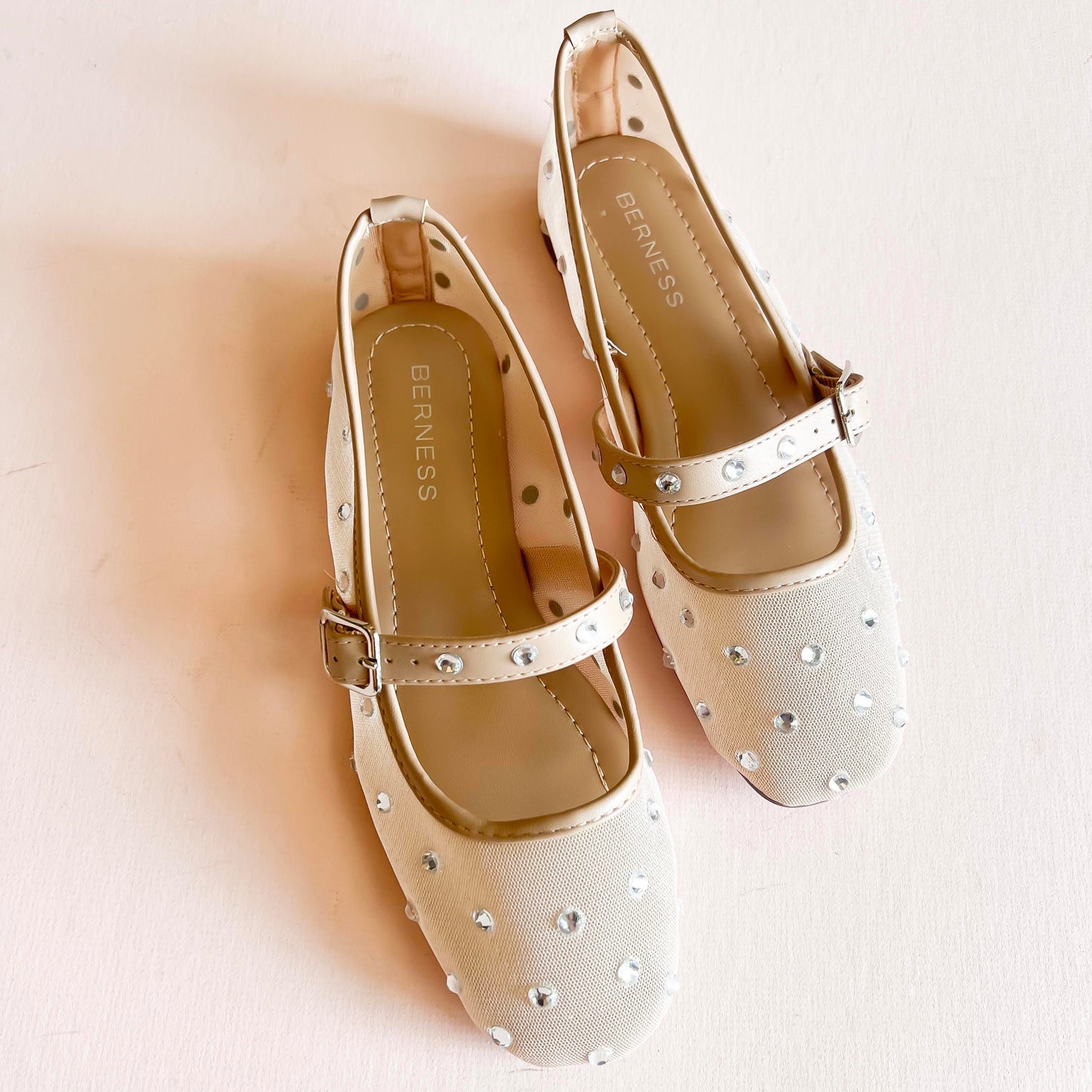 Beige mesh ballet flats with rhinestone embellishments and a Mary Jane strap by BERNESS