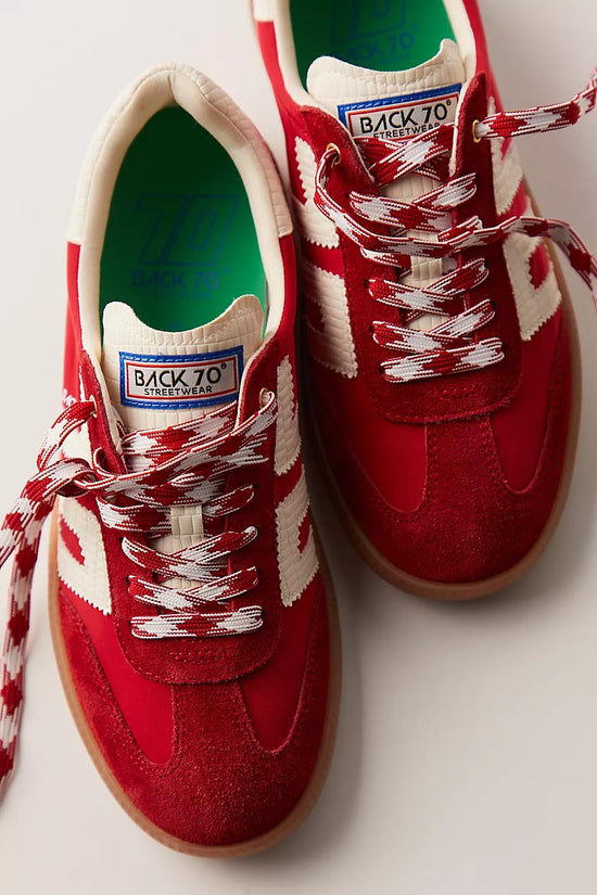 Top view of Back 70 Red Ghost Sneakers with vibrant red uppers, white chevron stitching, and checkered laces on a clean white background.