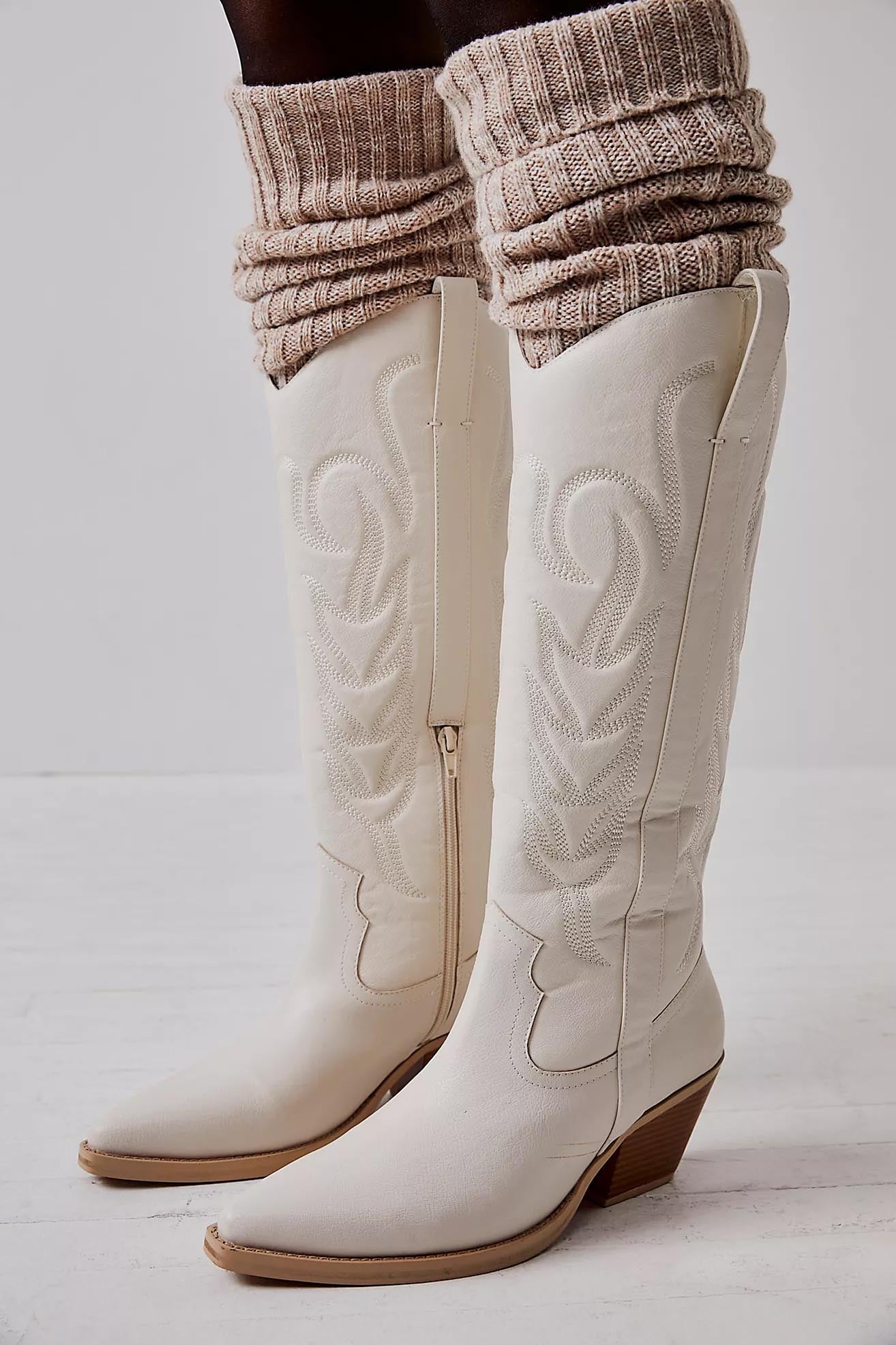 White vegan leather embroidered western cowboy boots with a pointed toe and mid-heel for women