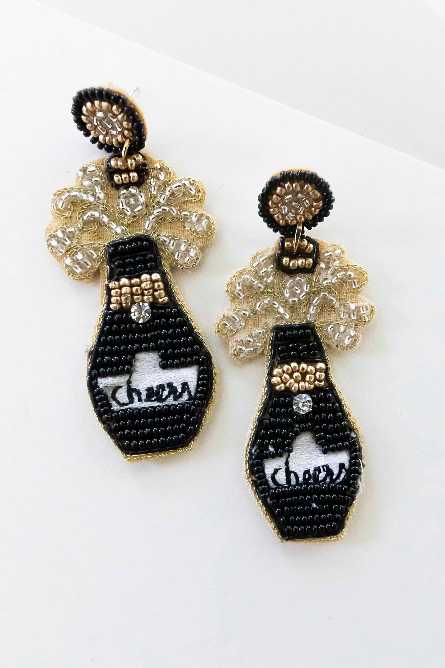 Load image into Gallery viewer, Cheers Black Champagne Earrings | Hand Beaded Party Earrings | Handmade New Years Earrings | Dainty Black and Gold Beads with Embroidery Detail
