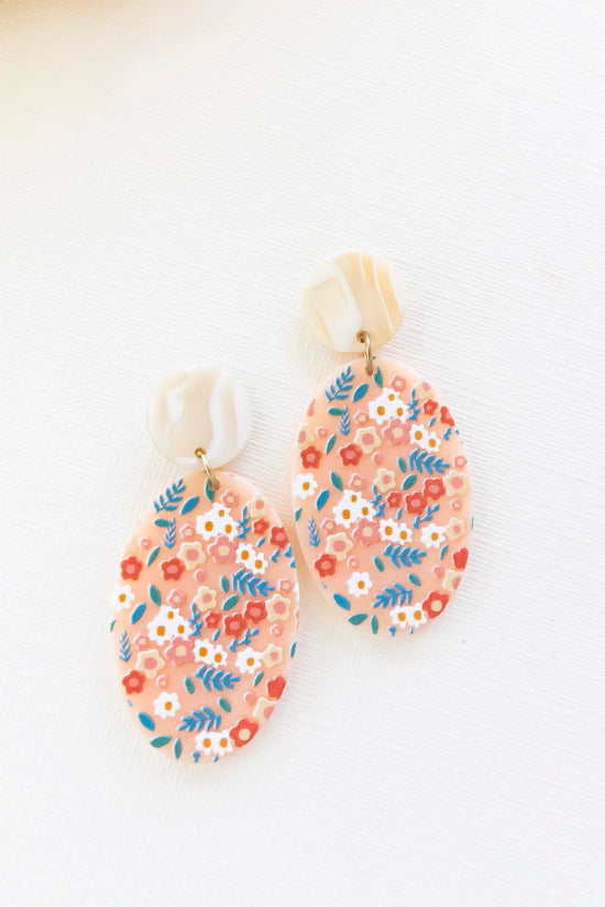 Load image into Gallery viewer, Heather Peach Resin Earrings | Floral Resin Drop Earrings | Oval Peach Backdrop with Dainty Flowers
