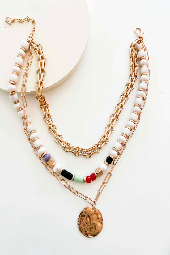 Load image into Gallery viewer, Riley Layered Necklace | Gold Chain and Cream Bead Details | Hammered Gold Charm Pendant | Gold Layering Necklace
