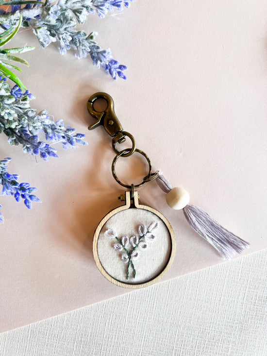 Load image into Gallery viewer, Hand Embroidered Floral Keychains | Handmade Flower Keychain | Boho Natural Wood Thread Tassel
