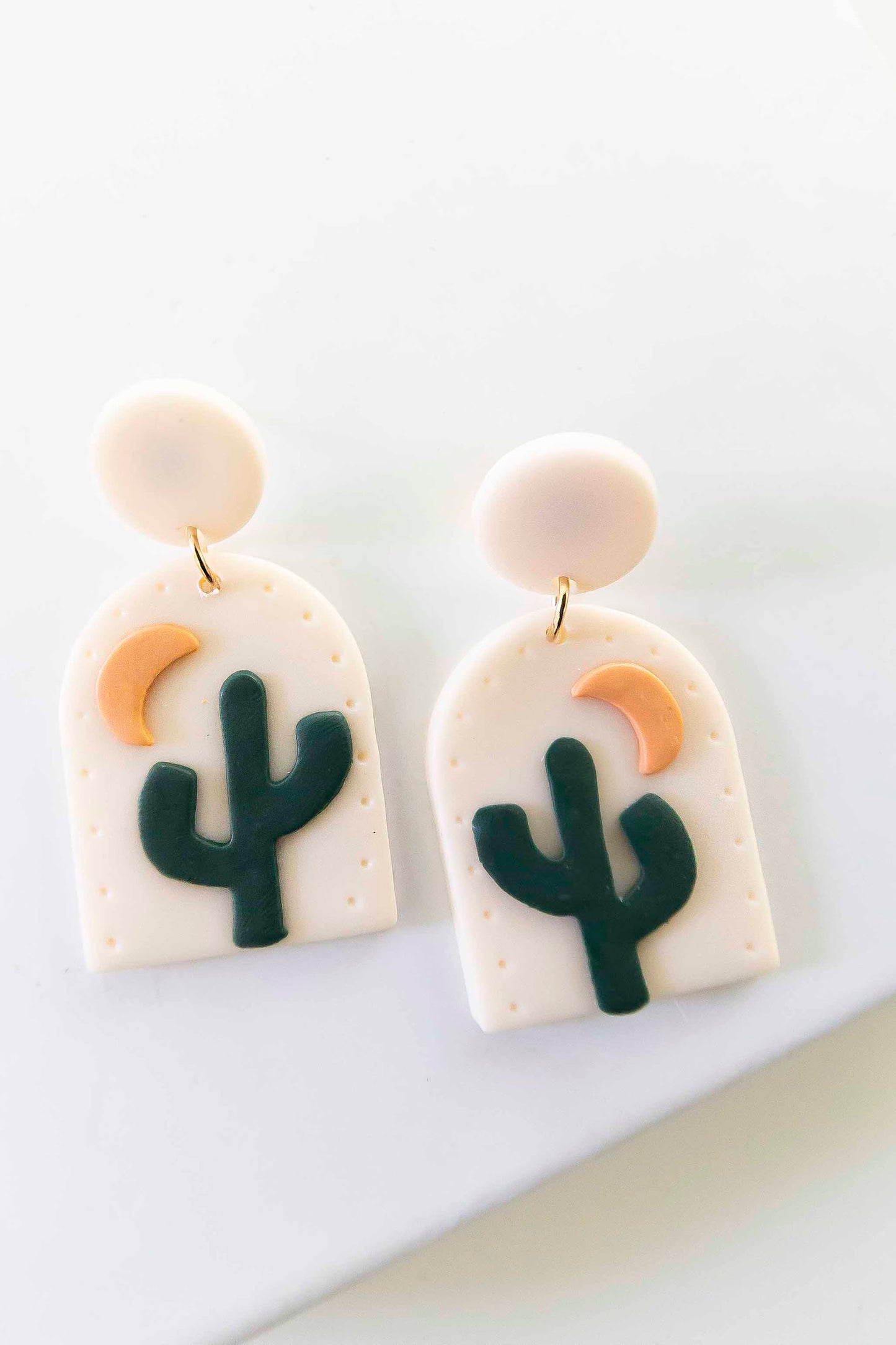 Winslow Clay Cactus Earrings | Sand Beige Clay Backdrop with Green Cactus Detail | Handmade Clay Earrings | Southwestern Desert Style